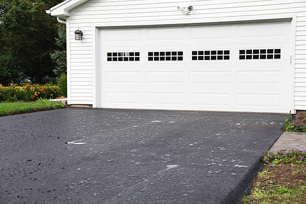 Signs Your Driveway Requires Immediate Repair Services in East Dundee, IL